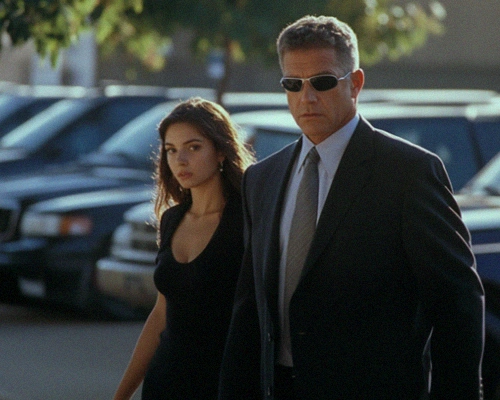 Close protection specialist protecting young female